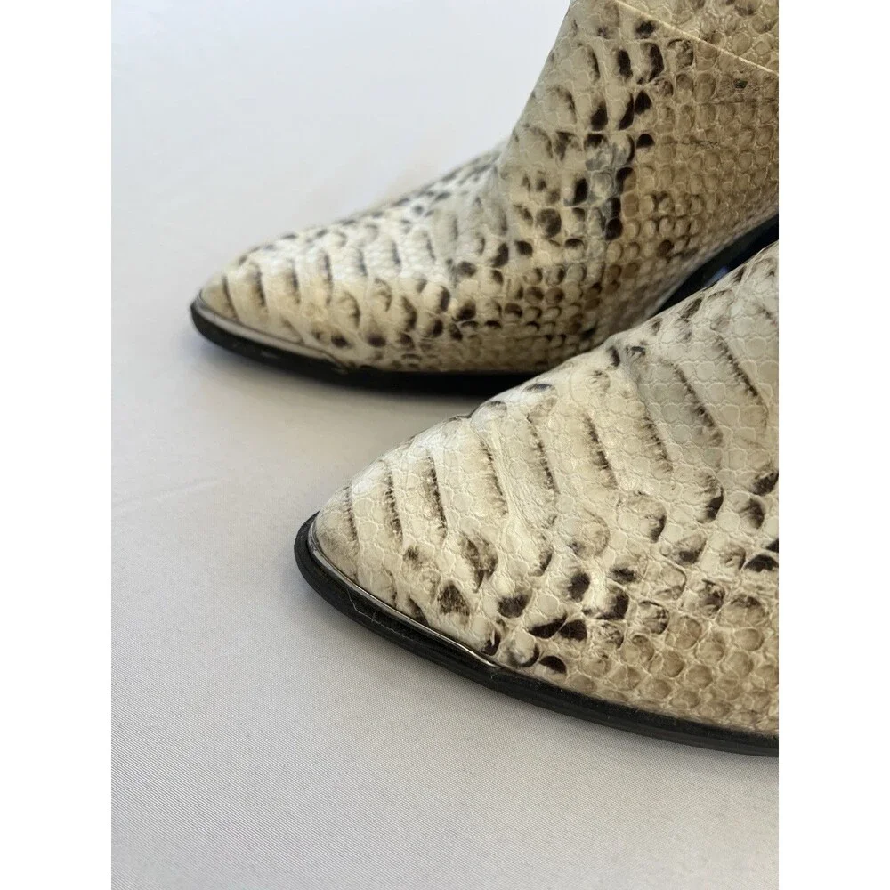Report trixi snakeskin